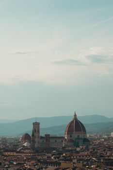 A beautiful aerial view of Florence's iconic Duomo and historic skyline during the day.