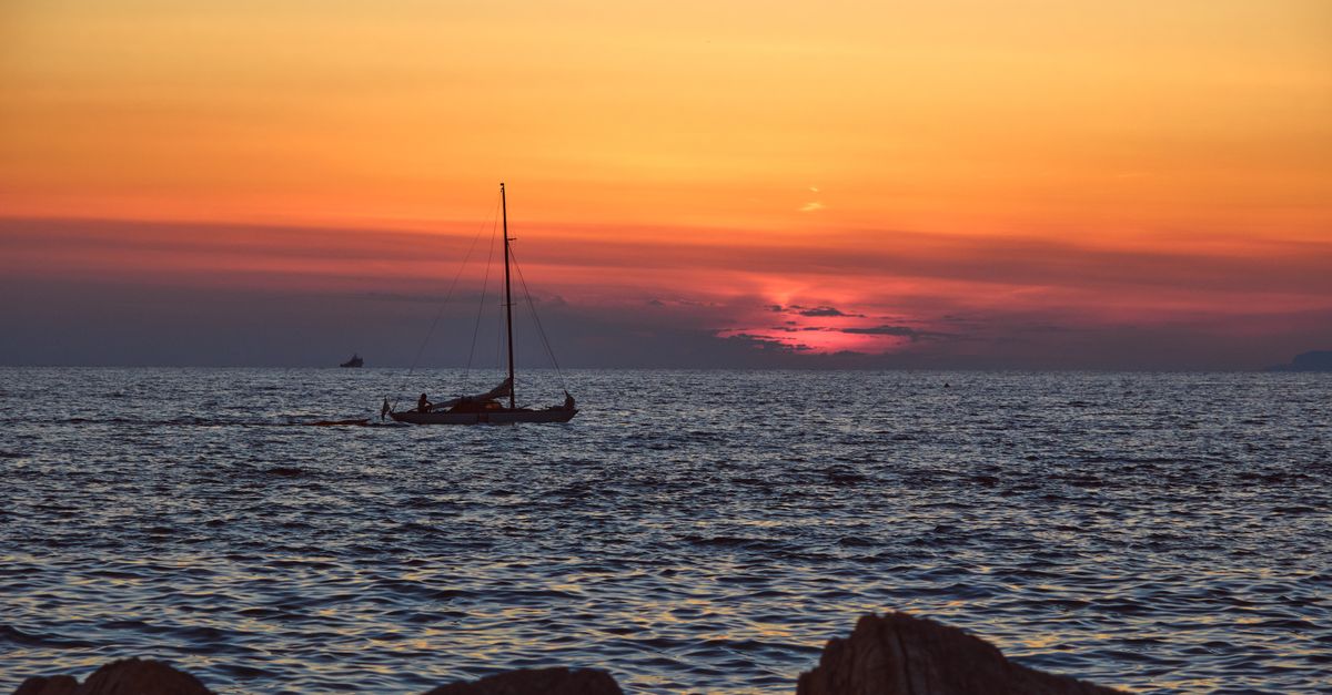 Romantic Caribbean coastline at sunset
