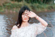 Woman Wearing White Floral Top