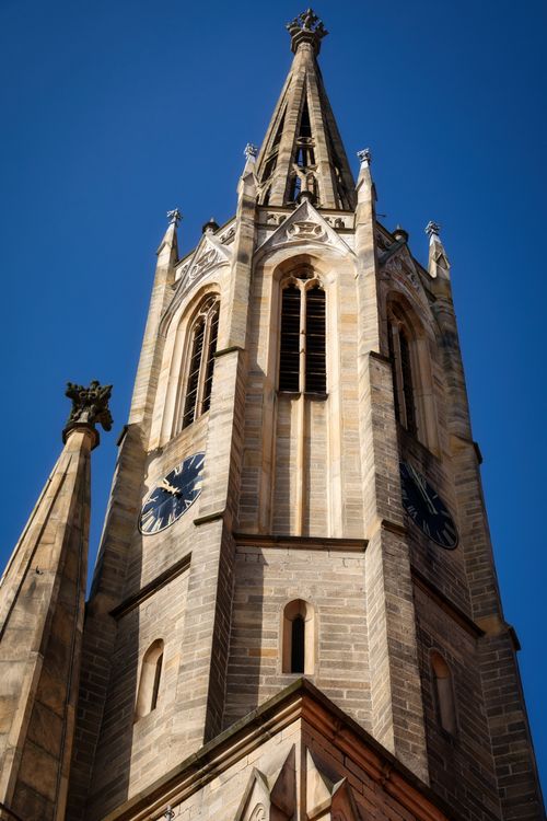 Free Majestic church tower in Bad Dürkheim, Rheinland-Pfalz, during a clear day. Stock Photo