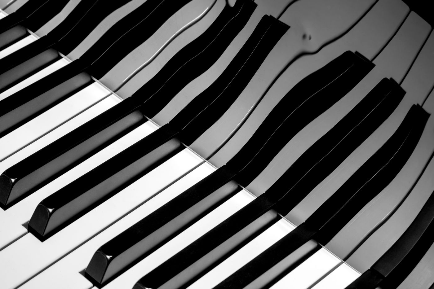 An abstract black and white study of piano keys