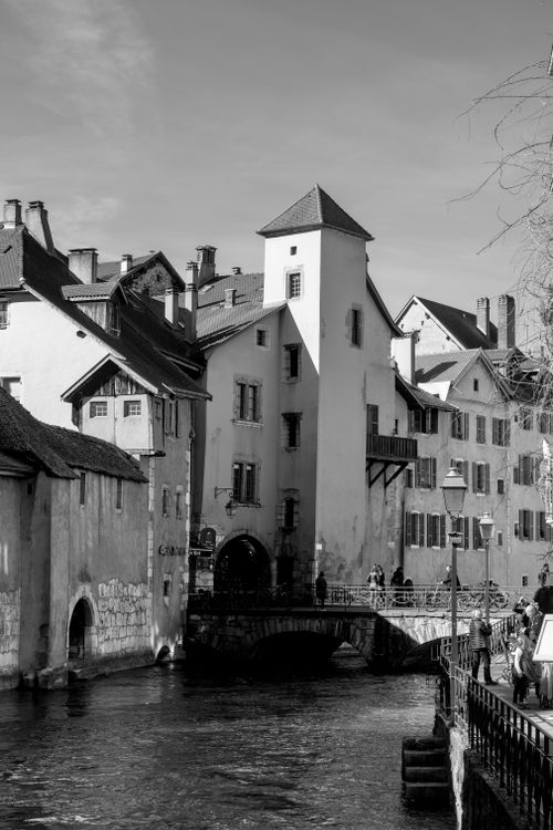 Free Black and white image of Annecy's historic architecture by the canal, capturing its charming old-world charm. Stock Photo