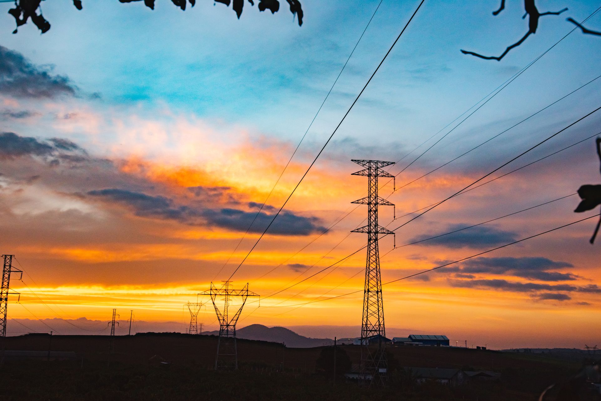 Silhouette of Electric Towers during Sunset