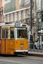 Historic Yellow Tram in Budapest Street Scene