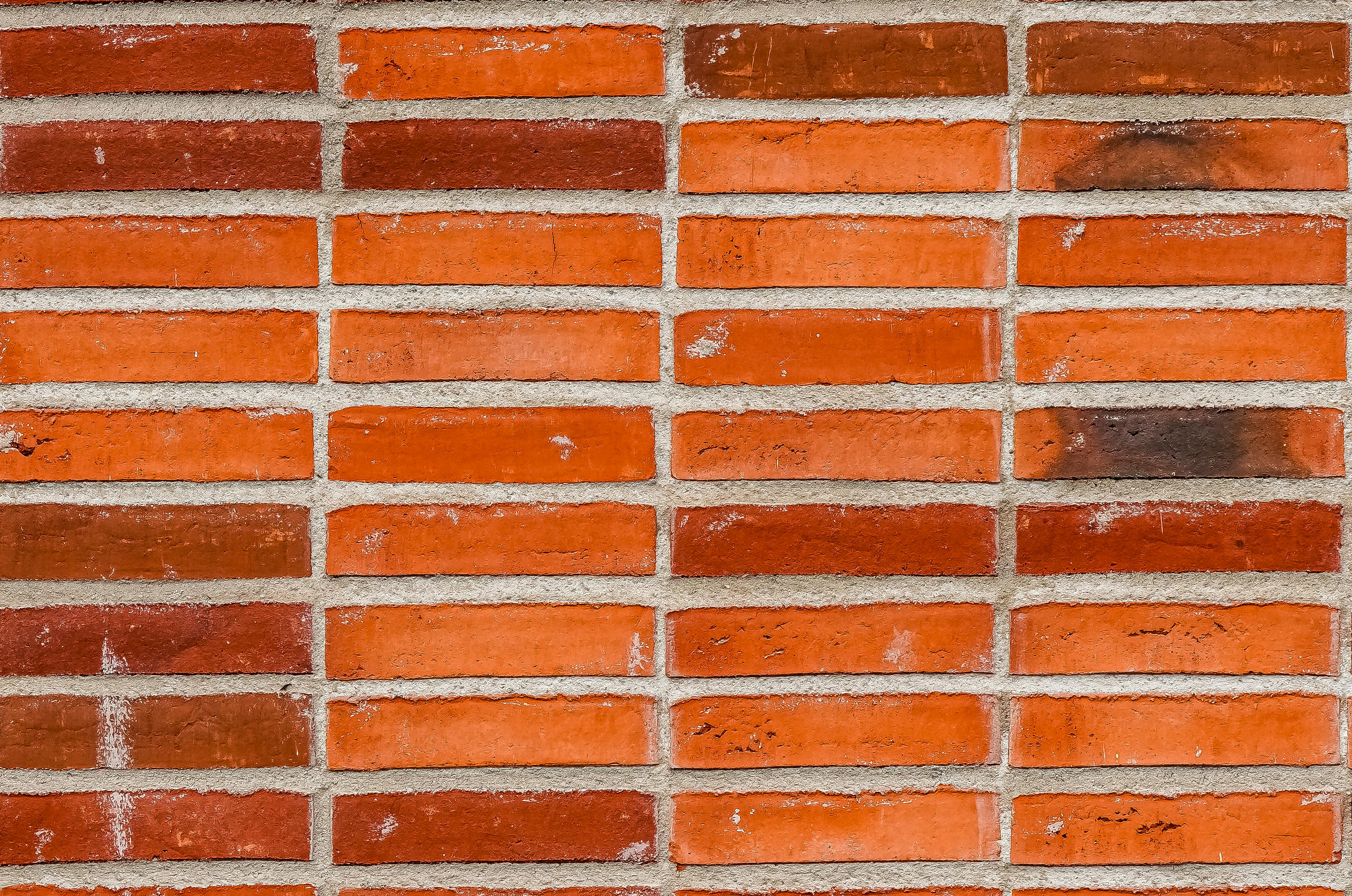 gratis Gedetailleerde close-up van een rode bakstenen muur met een klassiek voegpatroon. Stockfoto