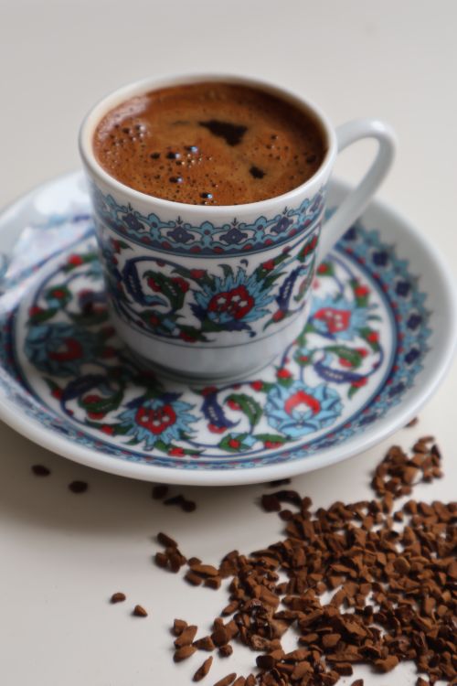 Free Close-up of Turkish coffee in a decorative cup with coffee grounds. Stock Photo