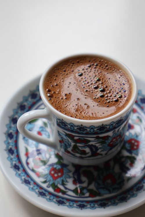 Free Close-up of Turkish coffee in a decorated cup on a matching saucer. Stock Photo