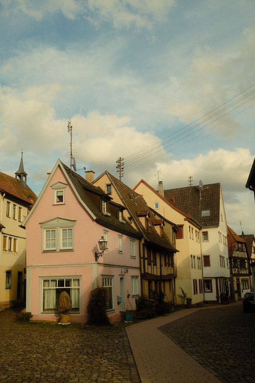 Free Picturesque view of historic houses on a cobblestone street in Lörrach, Germany. Stock Photo