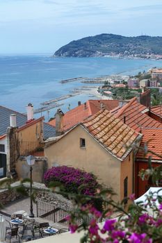 Picturesque view of coastal town rooftops overlooking the Mediterranean Sea.