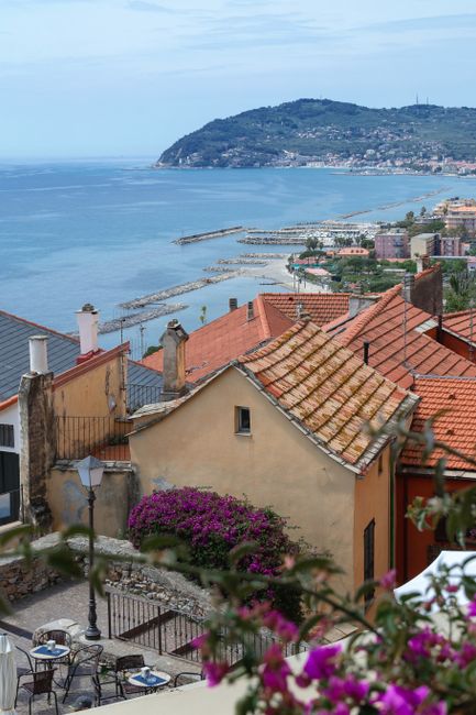 Picturesque view of coastal town rooftops overlooking the Mediterranean Sea.