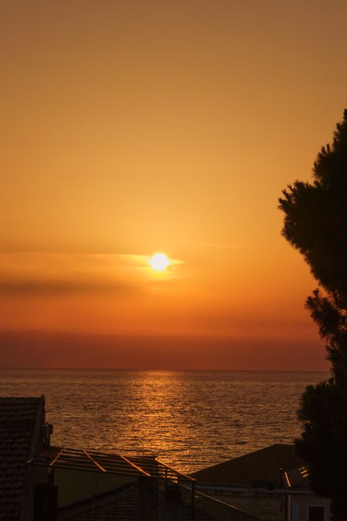 Free Breathtaking sunset view over the Mediterranean Sea in Santa Maria di Castellabate, Italy. Stock Photo