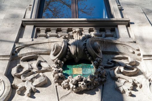 Close-up of an Art Nouveau facade in Tbilisi, showcasing intricate stone carvings and a decorative window.. pexels, close, no