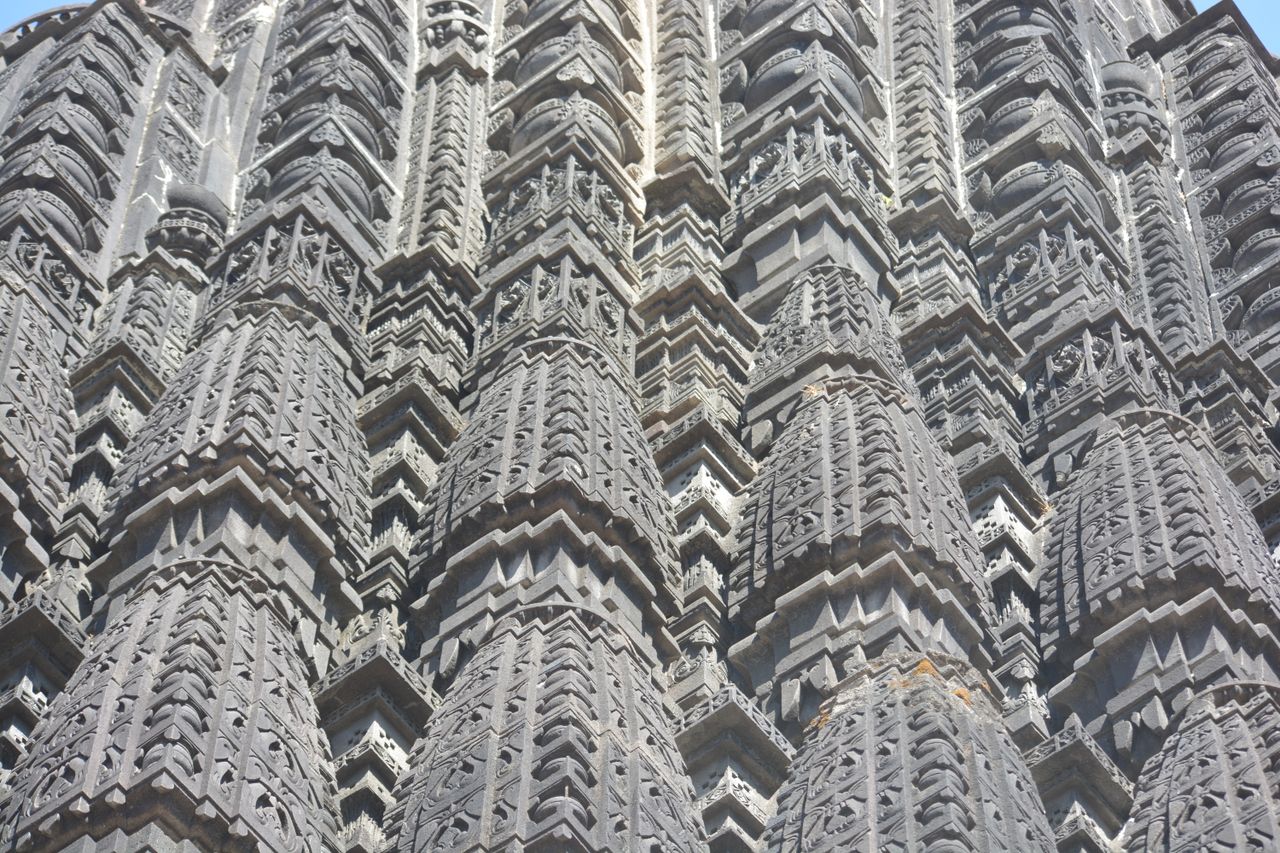 close up view of intricate stone carvings on a historical architectura