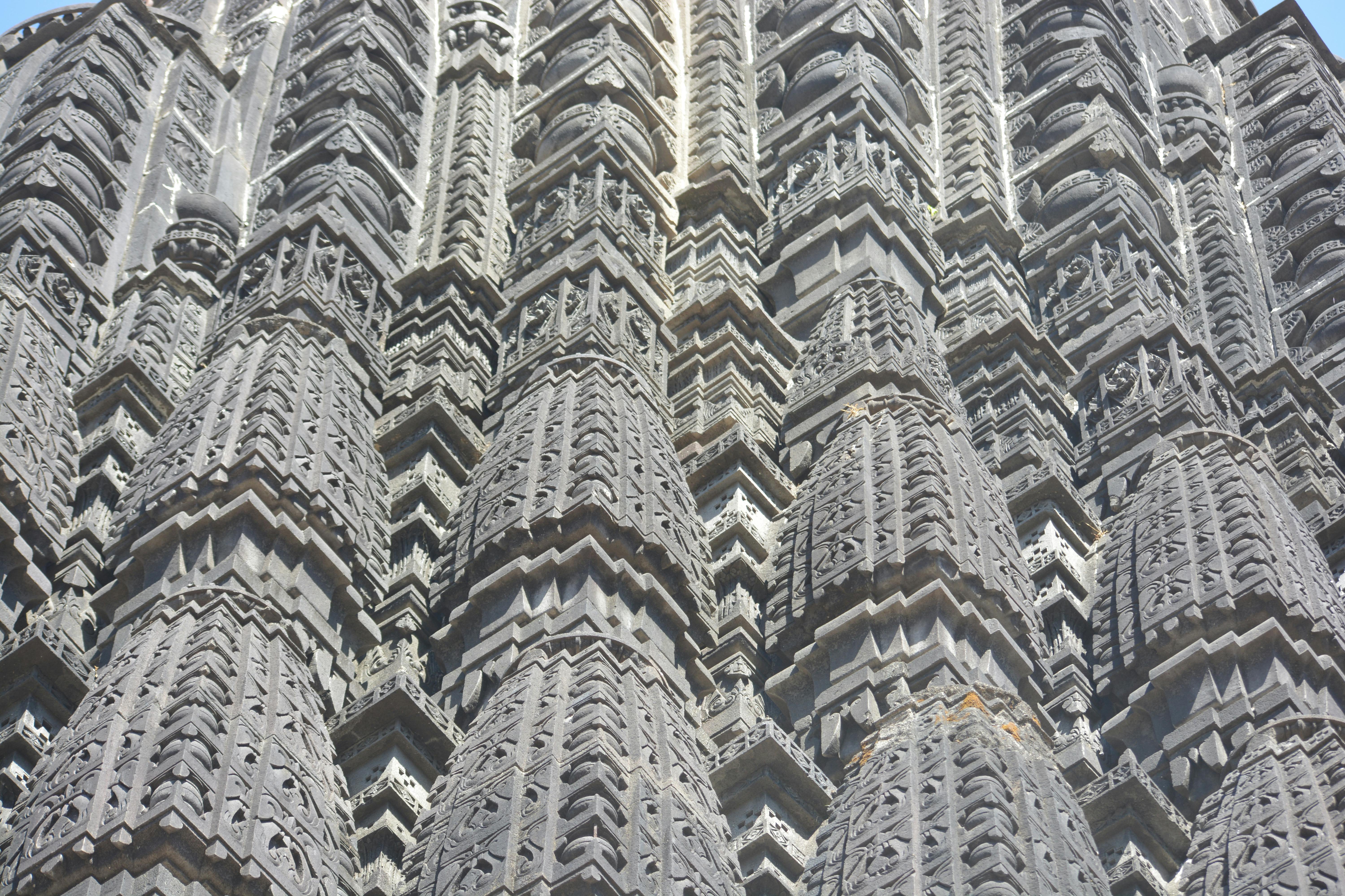 Free Close-up view of intricate stone carvings on a historical architectural facade. Stock Photo