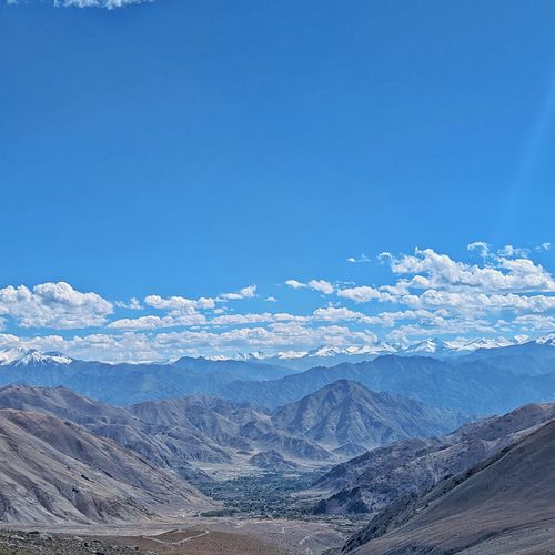 Free Stunning view of the Himalayan mountains and valley under a clear blue sky in Leh, India. Stock Photo