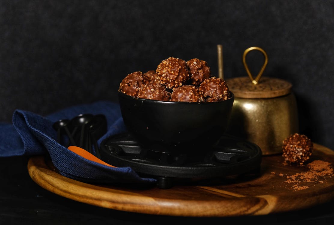 Chocolate On A Black Bowl