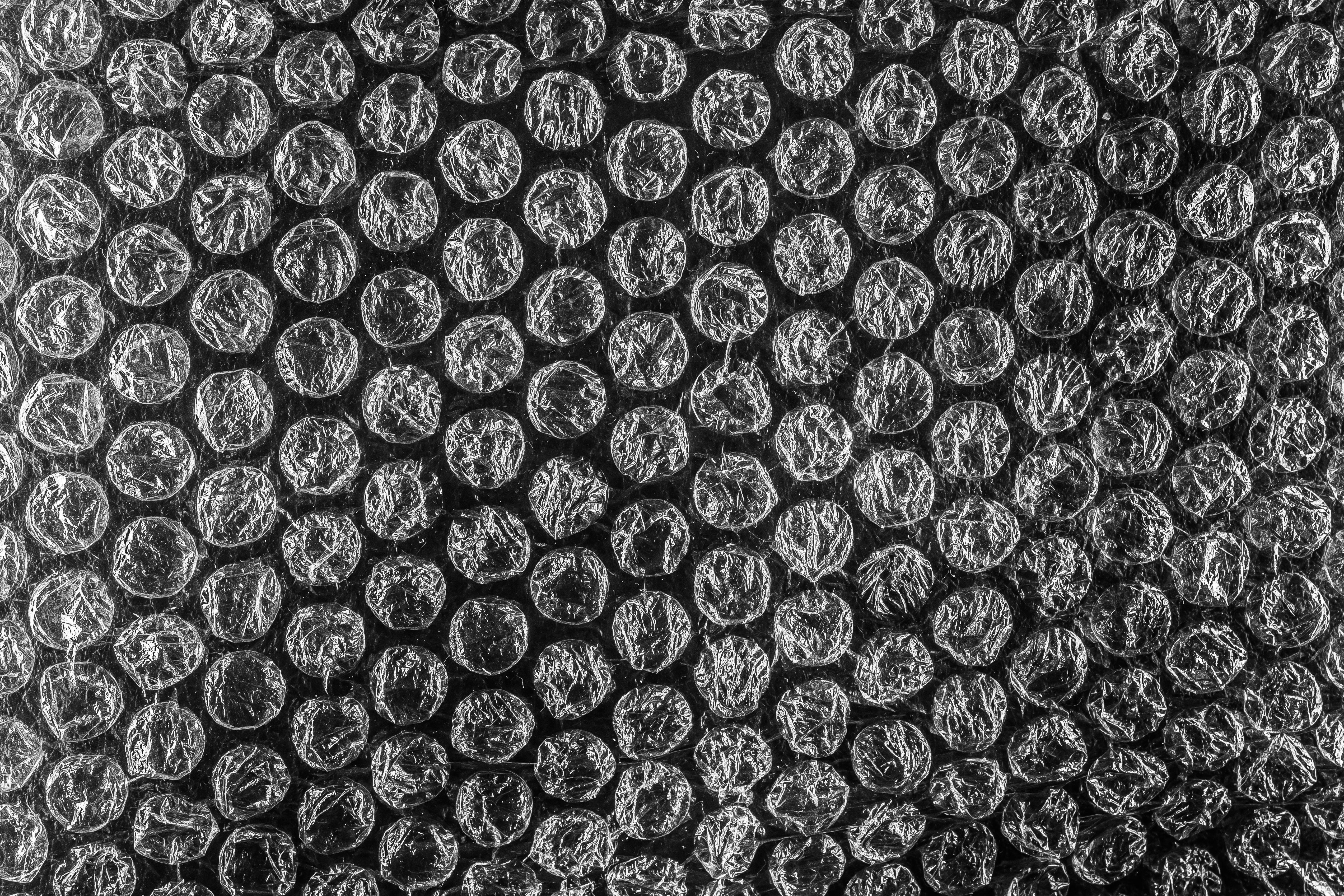 Gratuit Image haute résolution de papier bulle présentant une texture détaillée en monochrome. Photos
