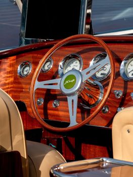Close-up of a classic wooden steering wheel on a vintage boat in Göcek, Türkiye. — photo by Ramazan Toygun