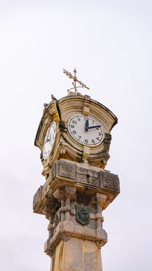 Free A detailed view of the iconic clock tower in San Sebastián, Spain. Stock Photo
