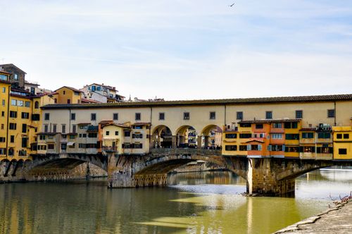 Free A picturesque shot of the historic Ponte Vecchio in Florence, Tuscany, Italy. Stock Photo