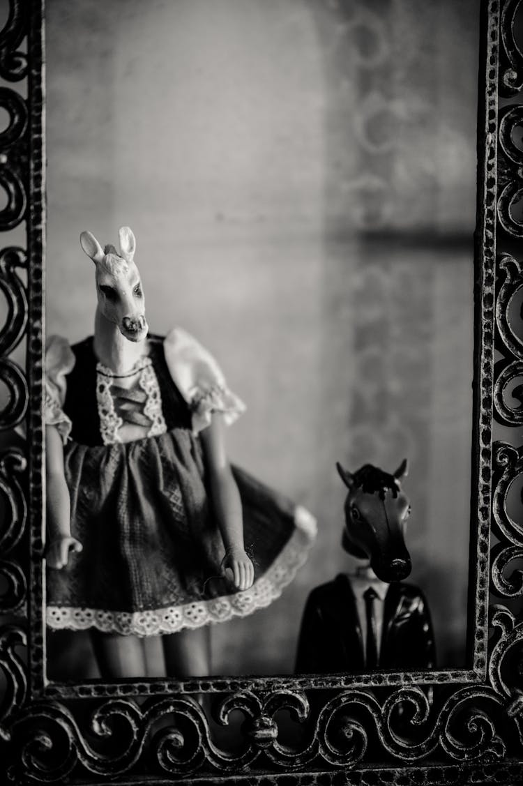 Grayscale Photo Of Woman In Black Dress Wearing A Mask Of An Animal Head