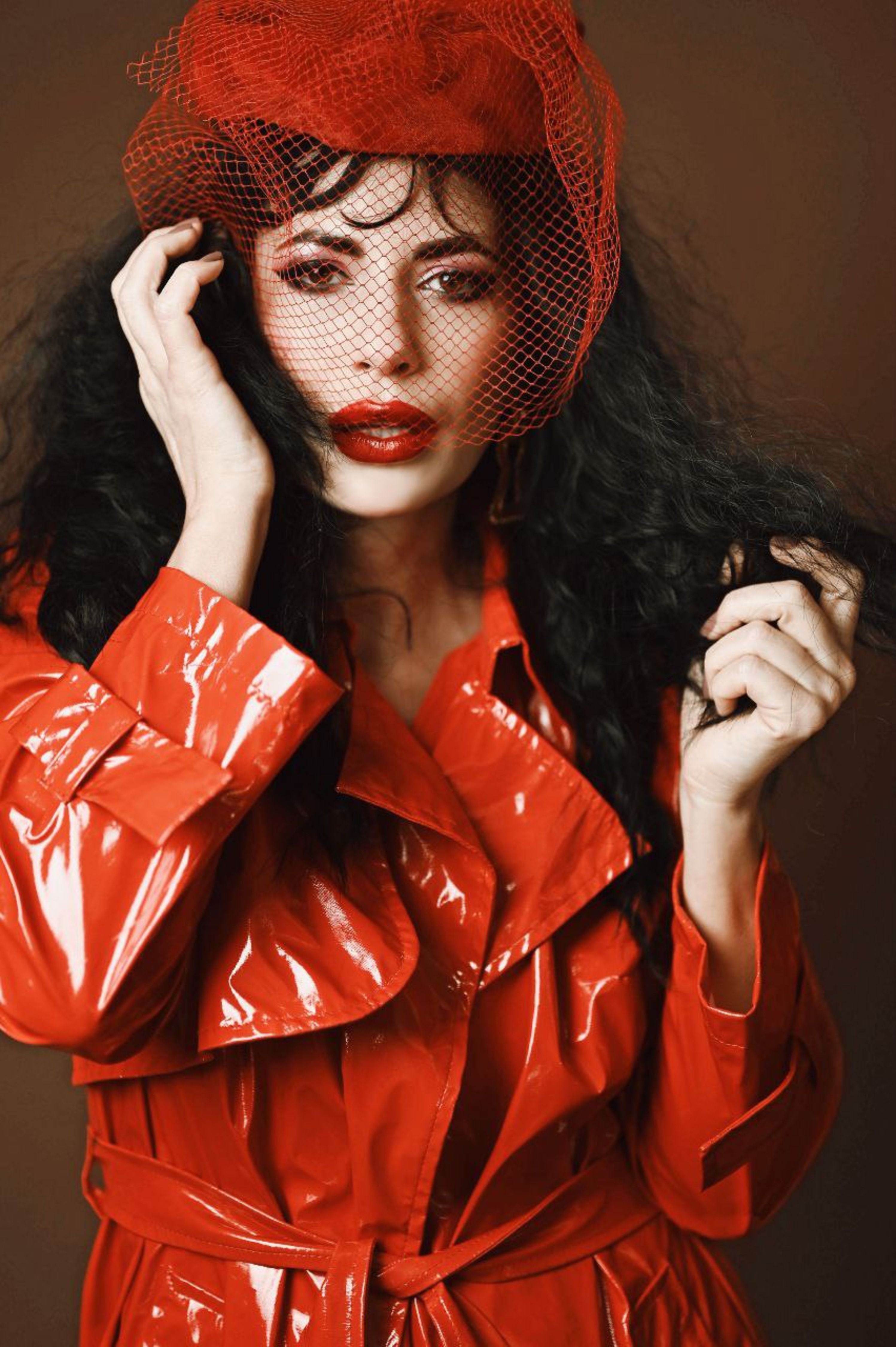 Elegant Woman in Vibrant Red Trench Coat · Free Stock Photo