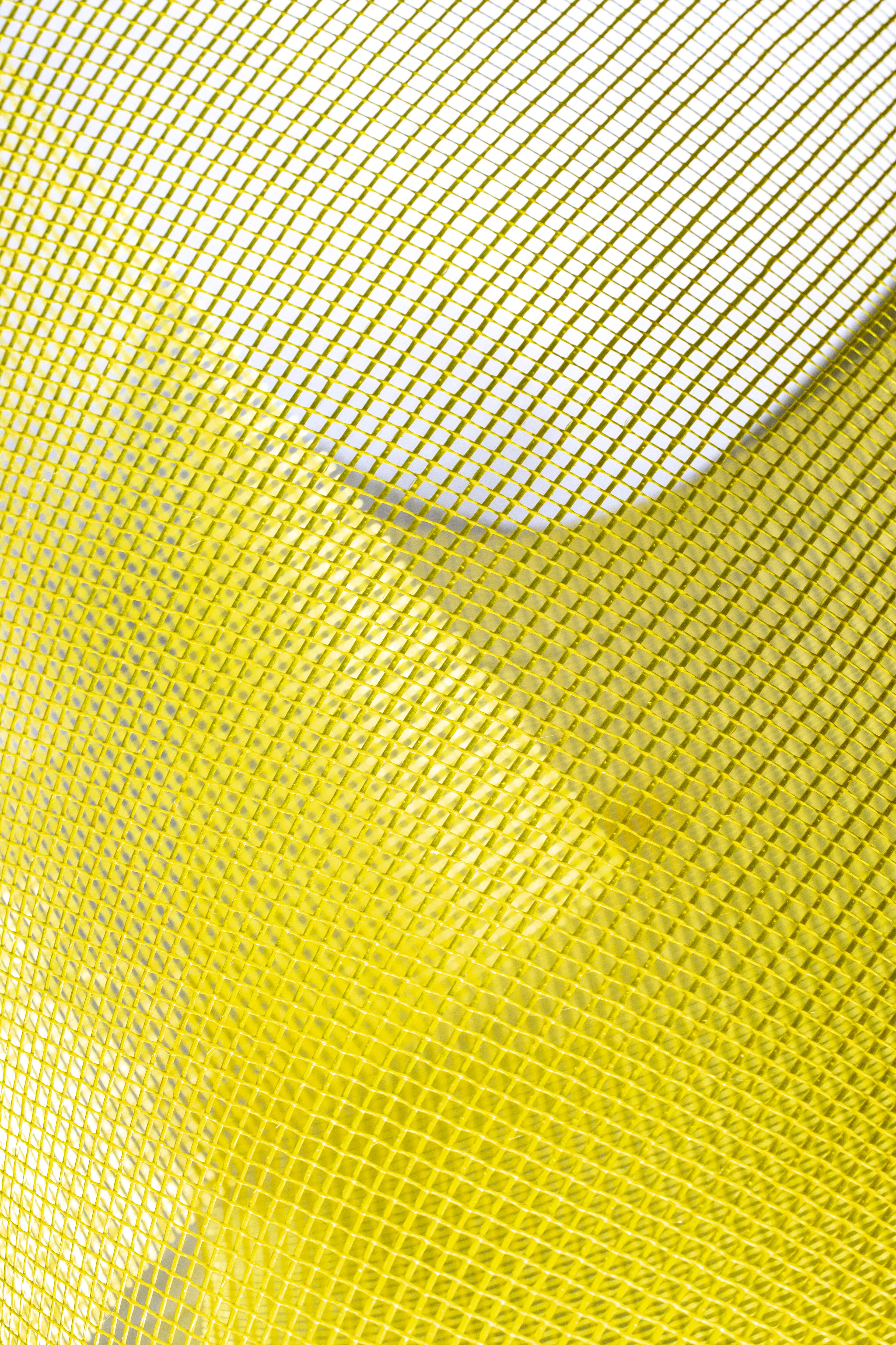 Abstract Yellow Mesh with Artistic Light Play · Free Stock Photo