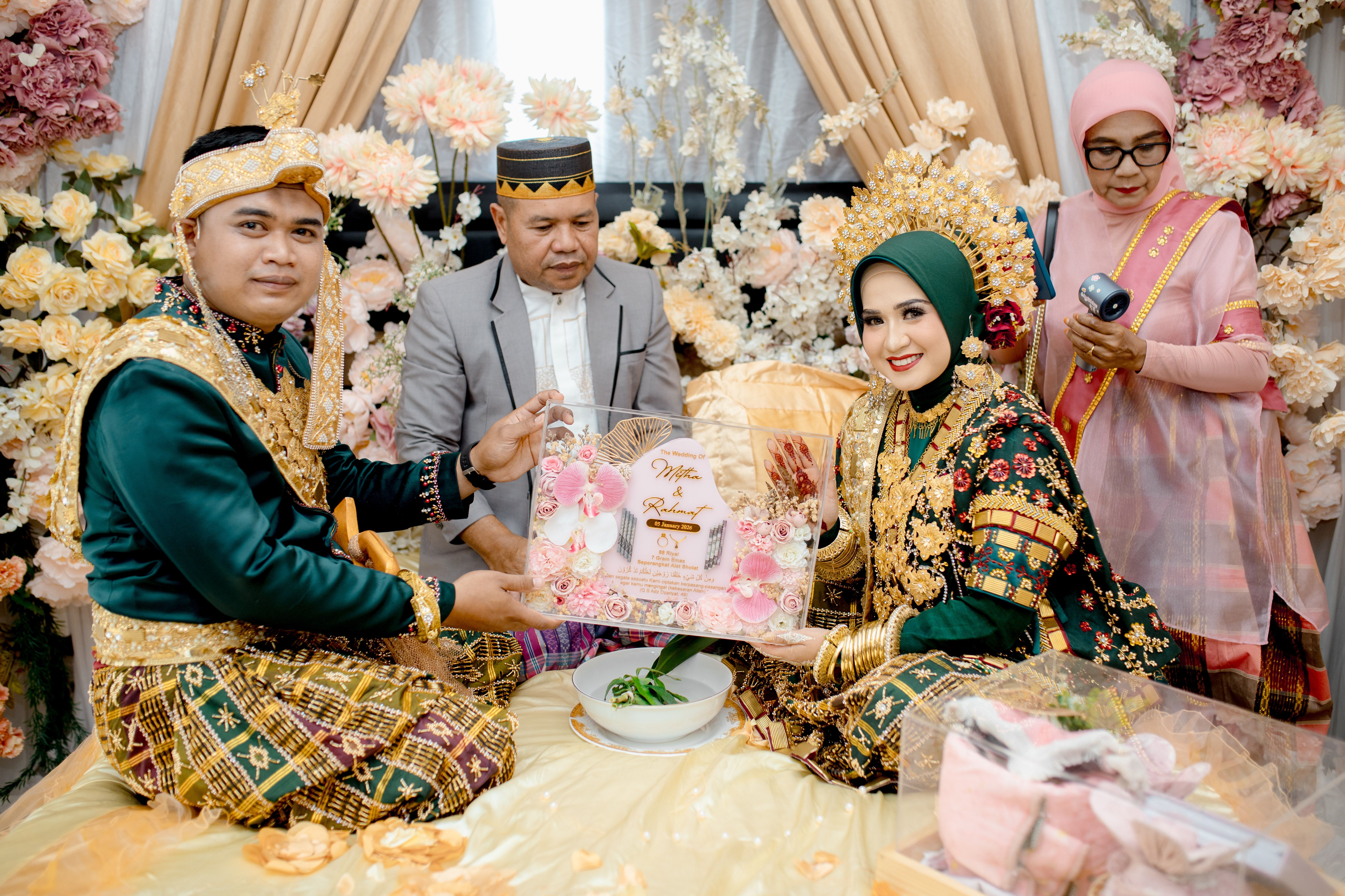 A vibrant traditional wedding ceremony in South East Sulawesi, showcasing local attire and cultural practices.