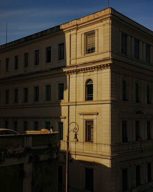 A beautiful historic building in Lazio, Italy with sunset lighting and classic architecture.