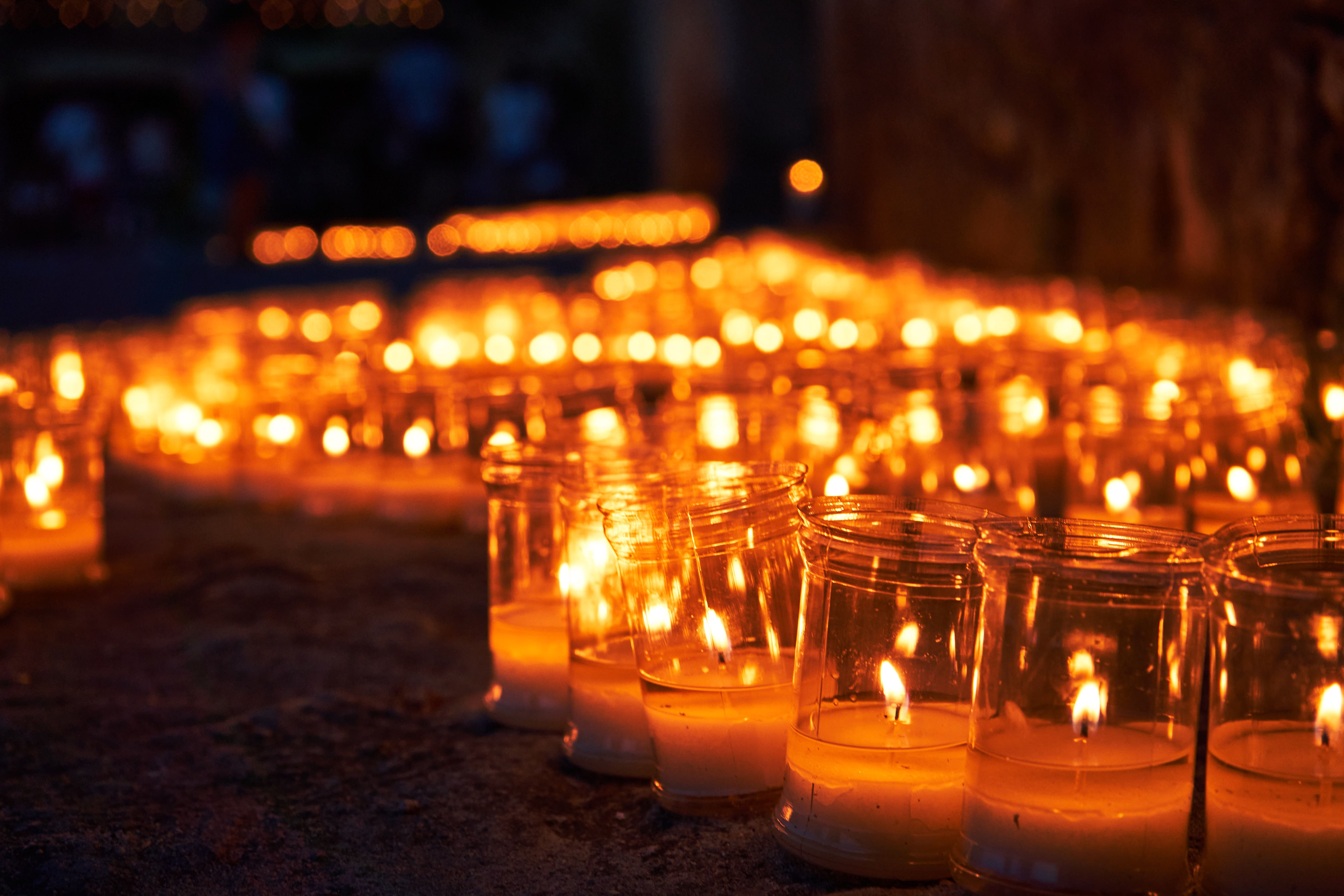 A mesmerizing display of candles illuminating the night in Pedraza, Spain, creating a warm and tranquil atmosphere.