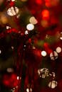 Vibrant Red Christmas Ornament in Bokeh Background