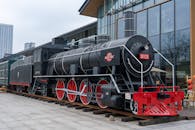Vintage Steam Locomotive Display at Urban Setting