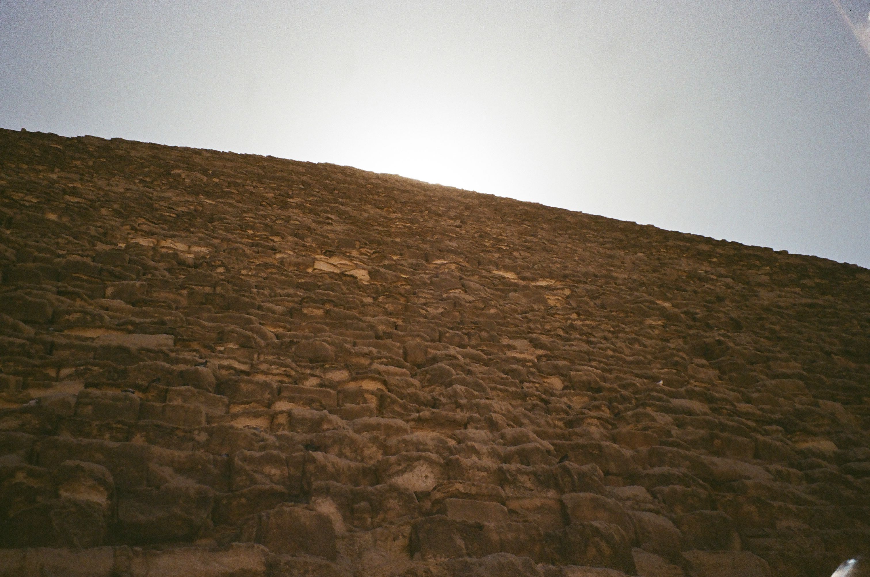 Sunlit View of Pyramid Stonework in Giza · Free Stock Photo