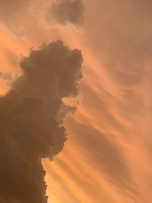 Free Captivating orange and gray clouds at sunset in Abuja, Nigeria, showcasing a dramatic sky. Stock Photo