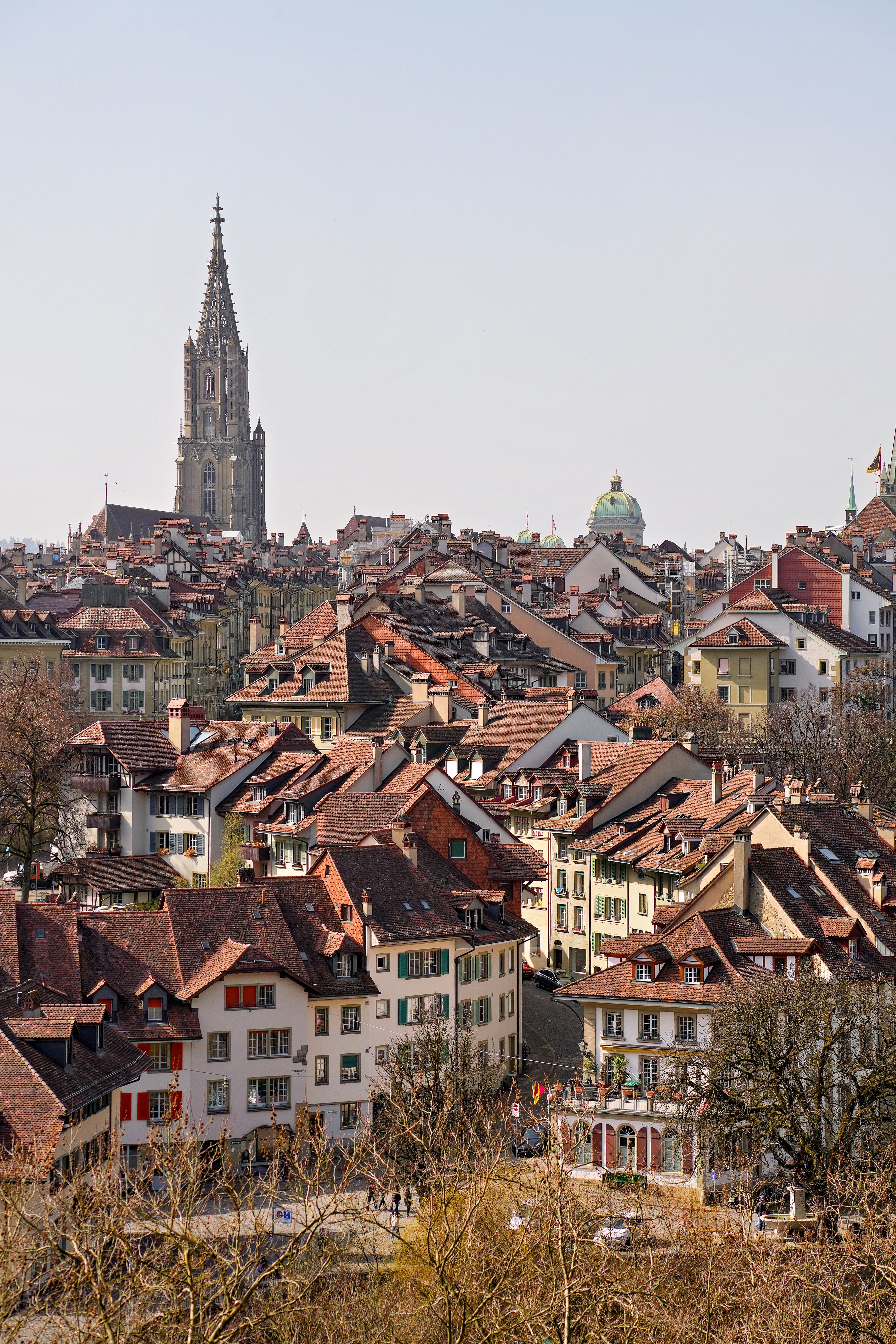A stunning view of Bern's historic old town with the iconic Bern Minster in the background.
