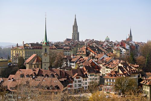 Free A captivating view of Bern, Switzerland, featuring iconic medieval architecture and the Bern Cathedral. Stock Photo