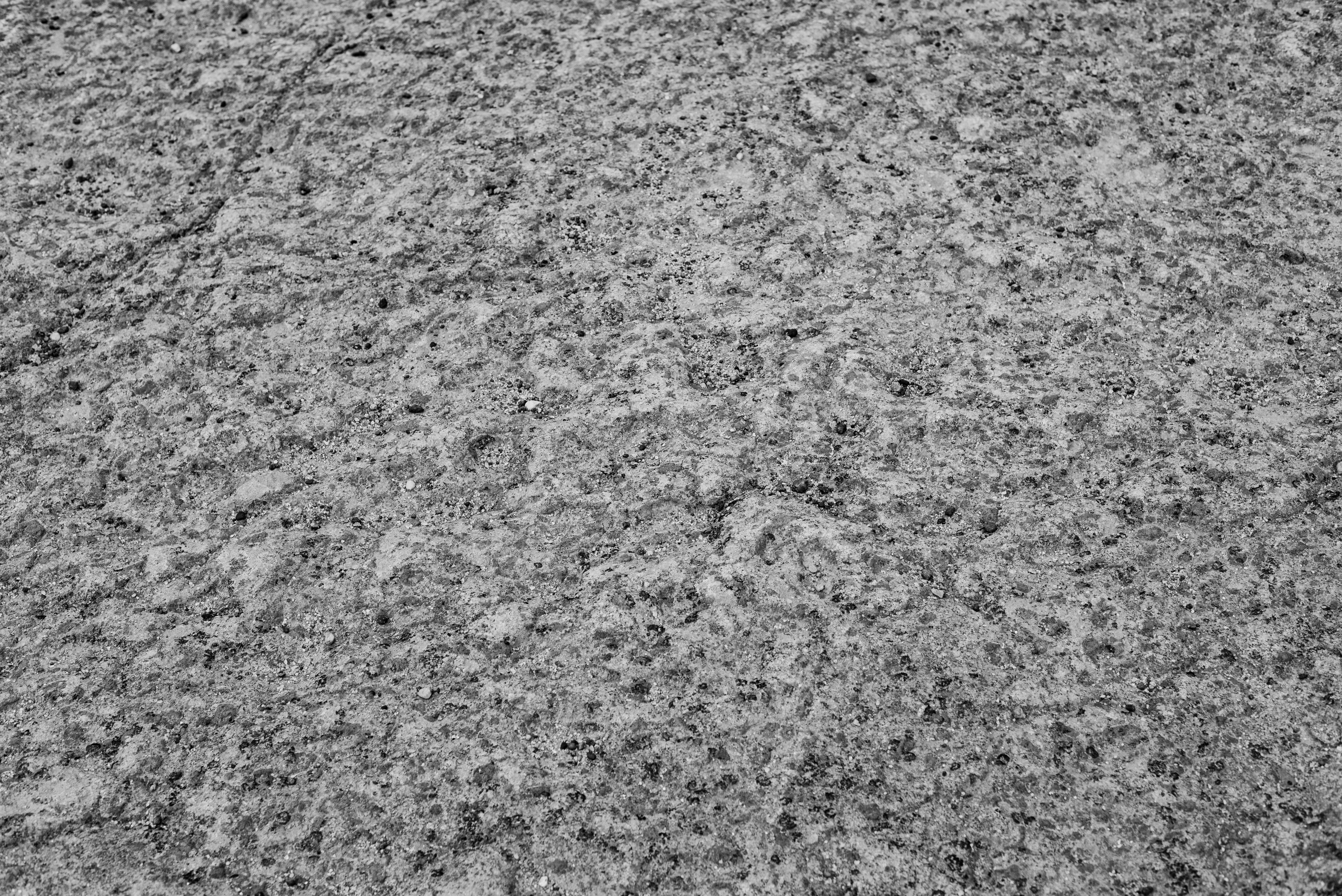 De franc Primer pla d'una superfície de roca de granit texturitzada a Natal, que captura patrons naturals intricats. Foto d'estoc