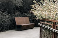 Serene Park Bench in Baku's Rustic Garden