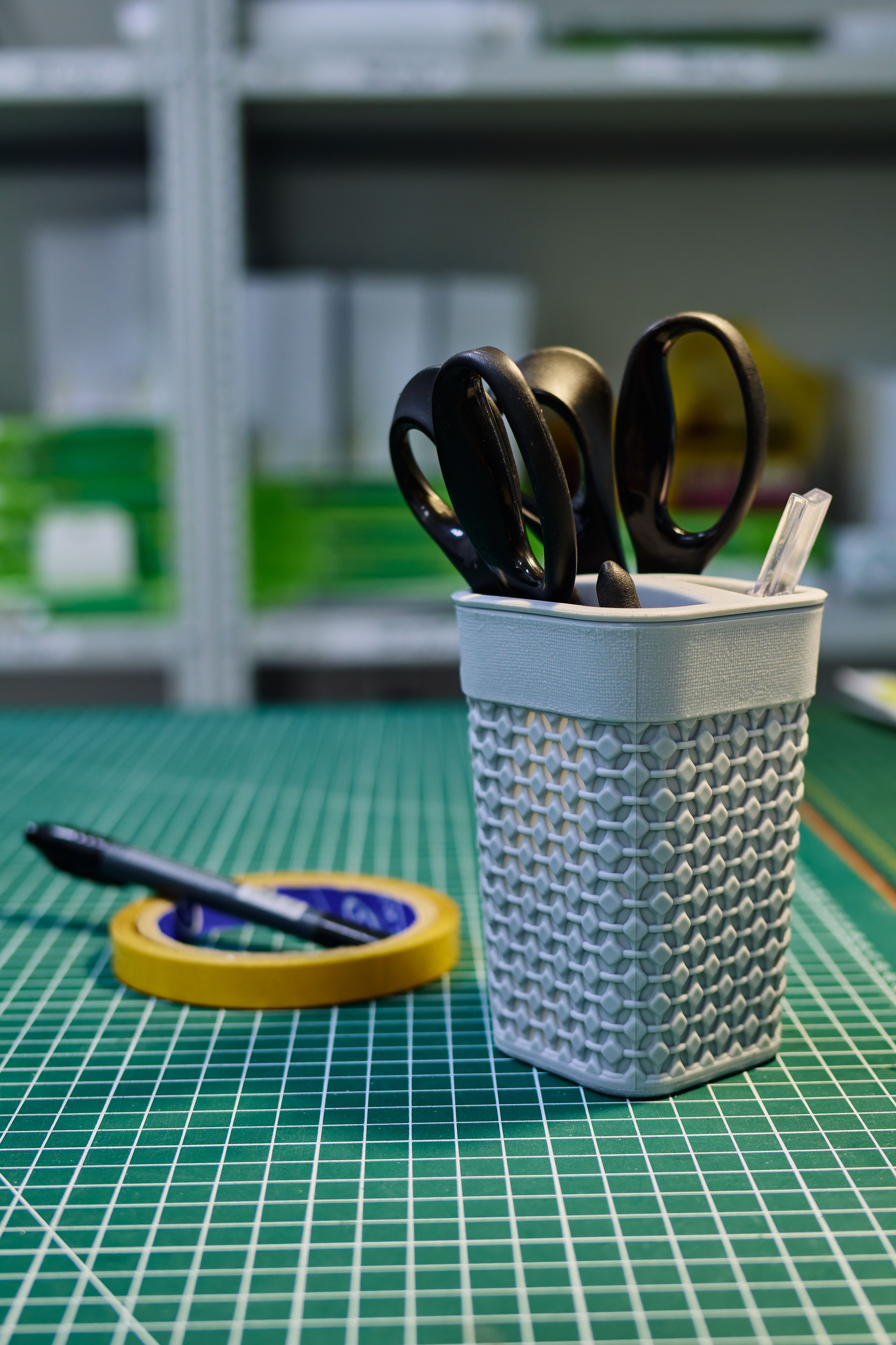 Desk caddy holding scissors and pens — photo by Primitive Spaces on Pexels