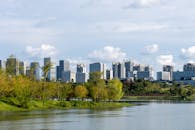 Modern City Skyline by Serene Lakeside