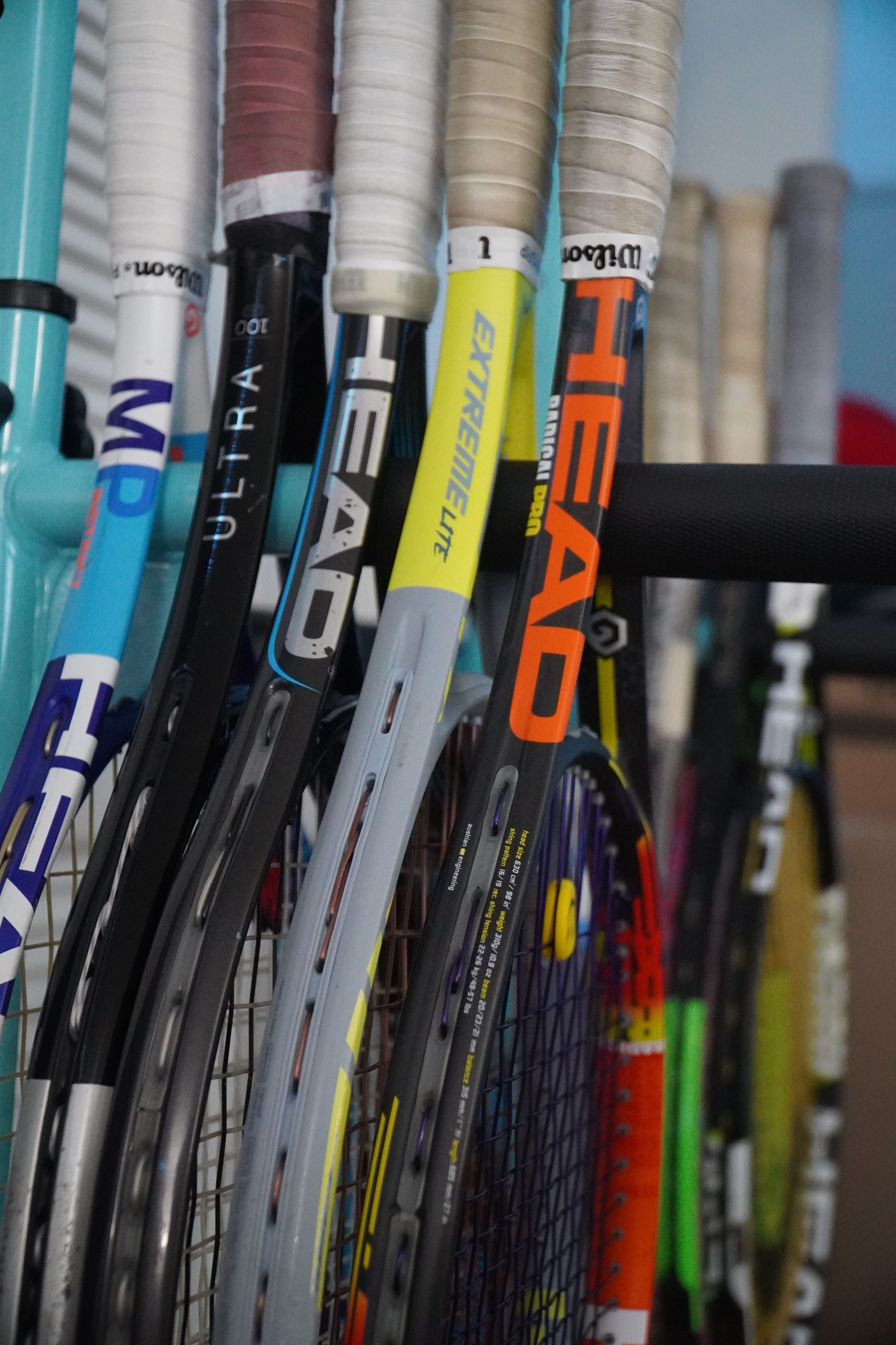 Close-up of Tennis Rackets in Storage · Free Stock Photo