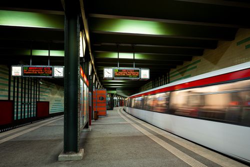Free Dynamic capture of a train speeding through a Hamburg subway station. Urban, efficient, and modern. Stock Photo