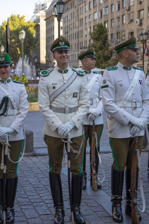 Free Chilean officers in ceremonial uniforms stand at attention during a military parade in Santiago. Stock Photo