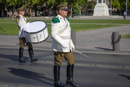 Free Military band marching in a ceremony at a Santiago park, Chile during the day. Stock Photo