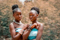 Photo Of Women Standing Beside Each Other