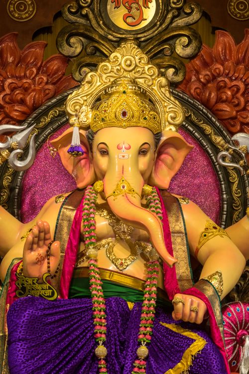 Free Colorful and ornate sculpture of Lord Ganesha celebrated during Ganesh Chaturthi in Mumbai, India. Stock Photo