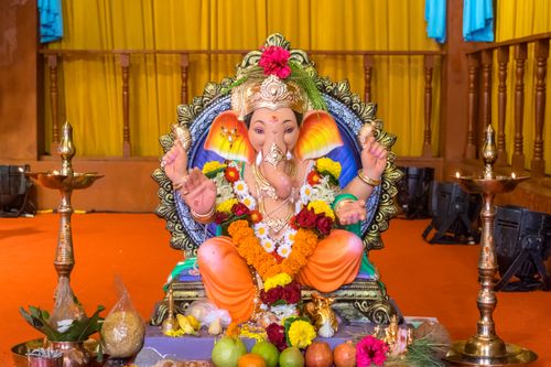 Free Colorful Ganesh idol adorned with flowers during Ganesh Chaturthi festival in Mumbai, India. Stock Photo