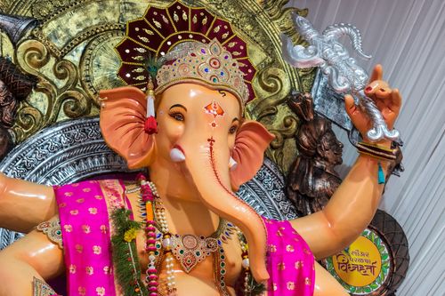 Free Colorful Ganesh idol during Ganesh Chaturthi festival in Mumbai, showcasing traditional Hindu artistry and worship. Stock Photo