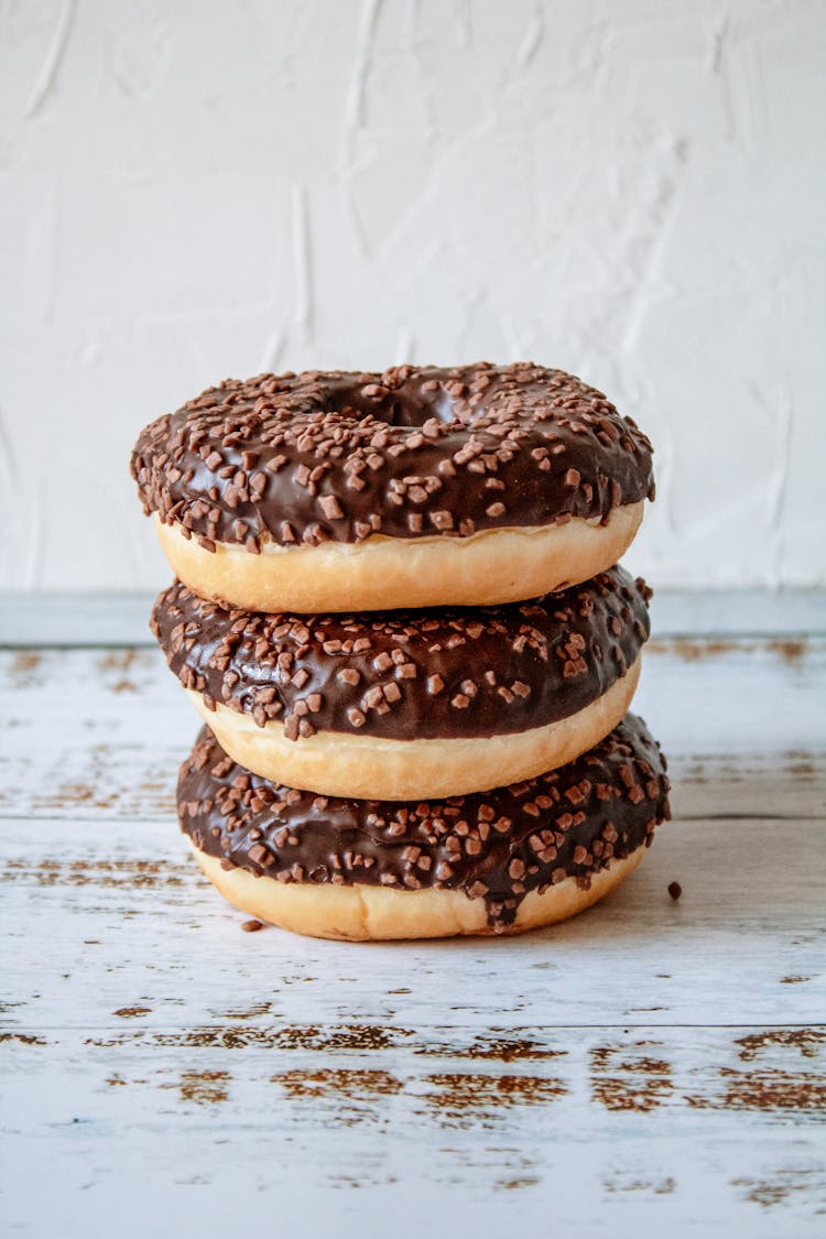 Photo Of Stacked Chocolate Donuts