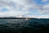 Scenic View of Eyjafjörður with Boats in Iceland